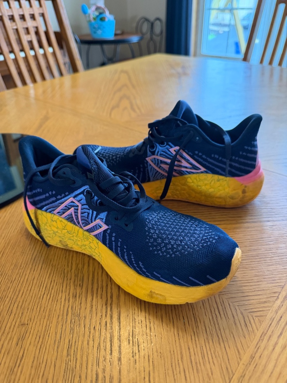 New Balance Navy Running Shoes with Yellow Midsole and Pink Accents